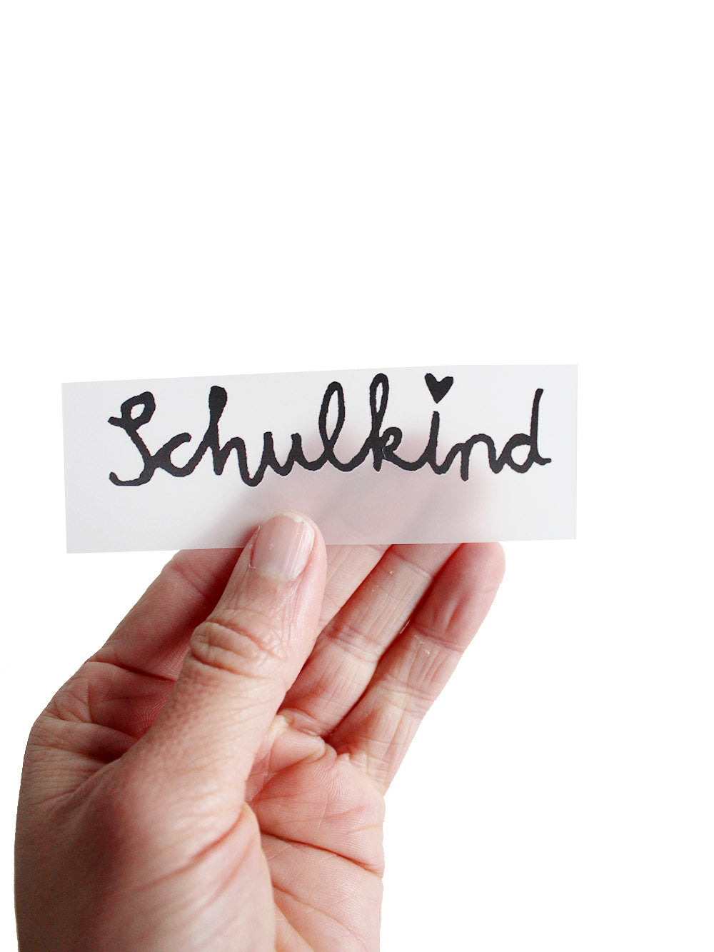 bügelbild randlos mit schriftzug schulkind von halfbird in hand gehalten