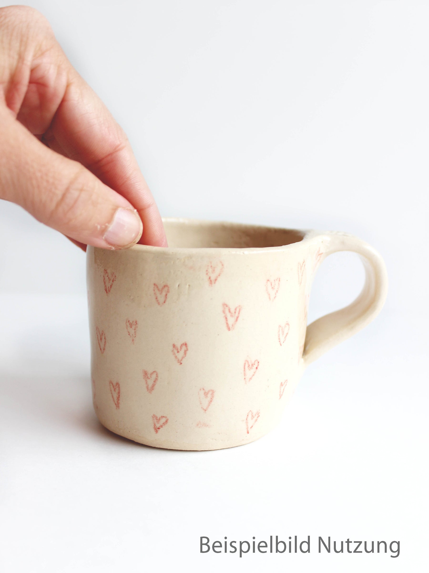 Beispiel Tasse bemalt mit rotem Unterglasurstift von Hobbyceram