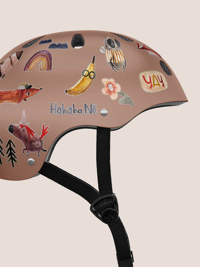 reflektierende Aufkleber Einhorn, Dackel, Banane, sprüche, blume und Regenbogen auf einem Fahrradhelm in rose