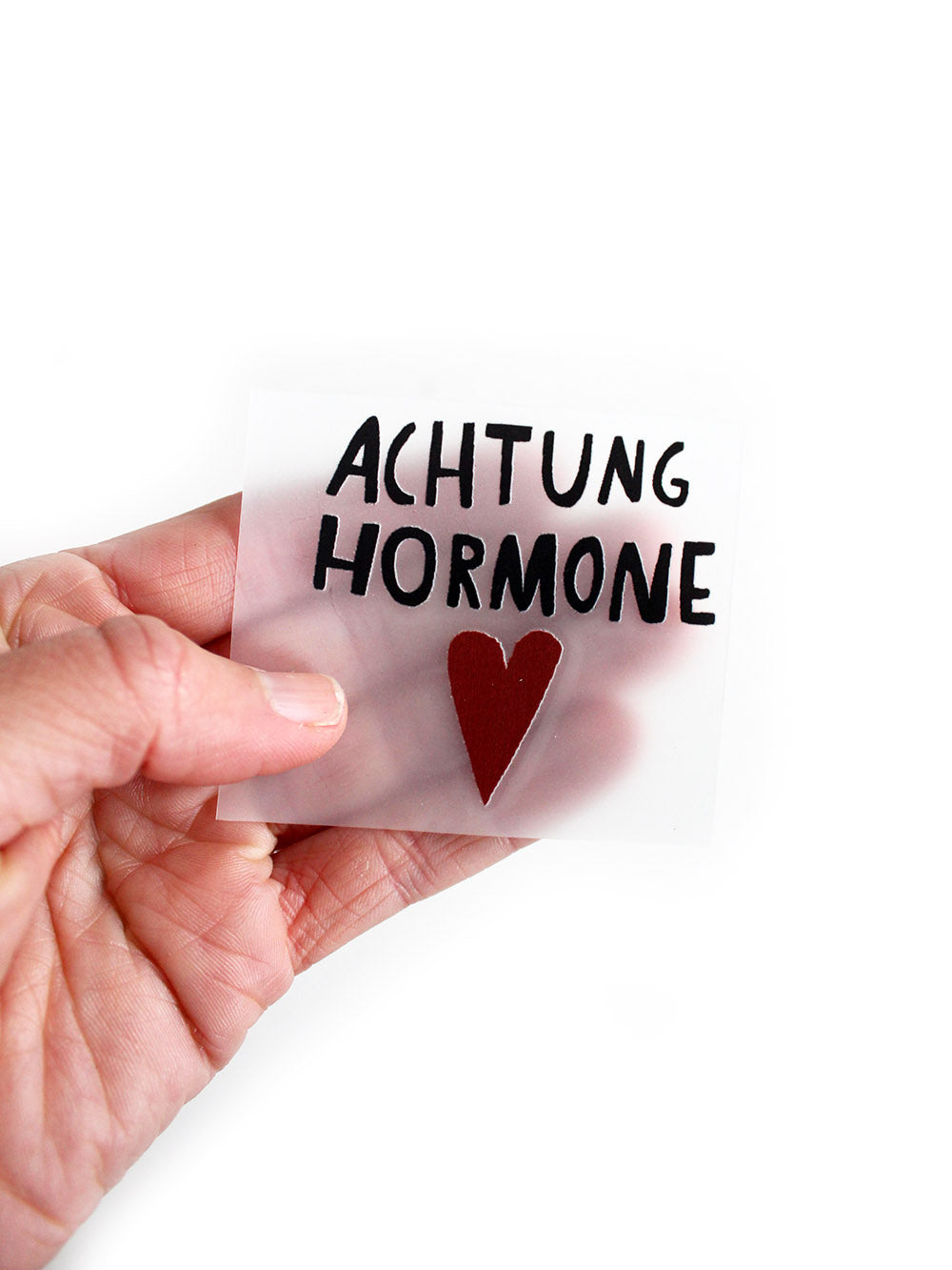 Bügelbild randlos "Achtung Hormone"