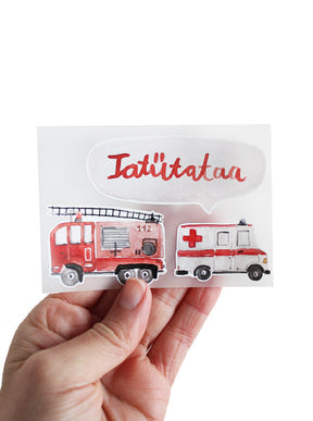 Hand hält ein Bügelbilder set mit Krankenwagen, Feuerwehr und tatütataa in sprechblase in rot
