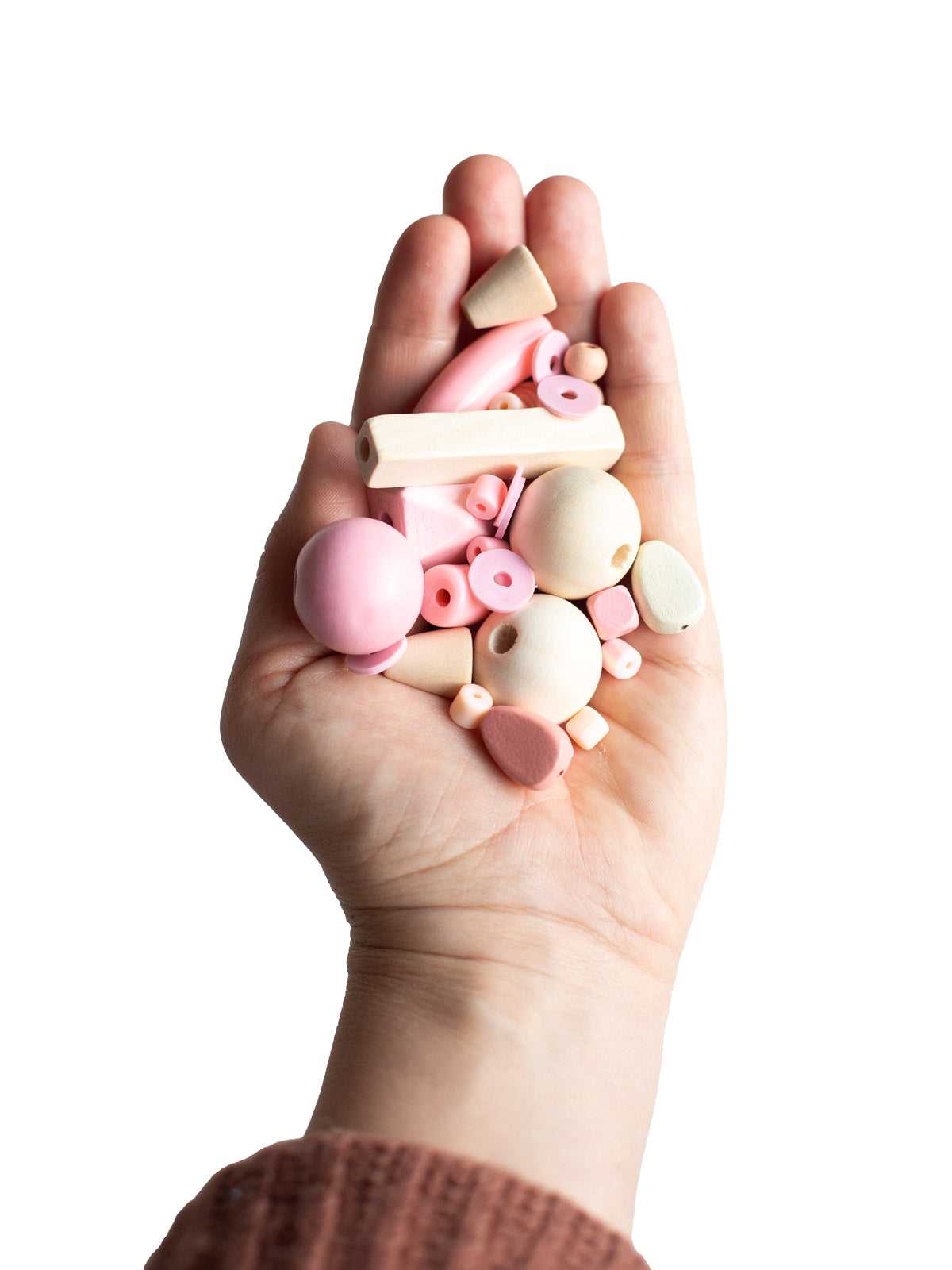 Hand mit Perlenset Babypuder von Halfbird