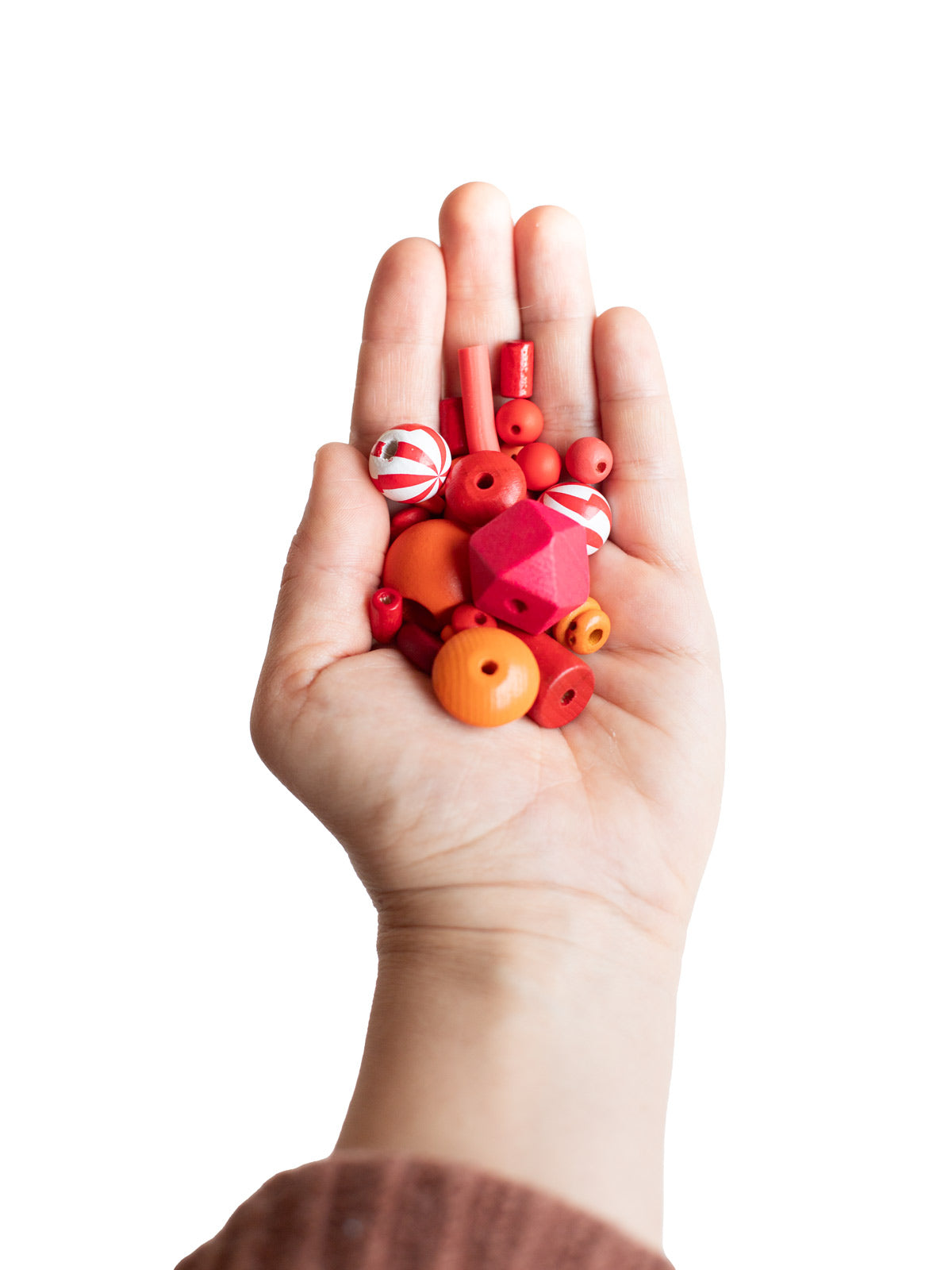 Hand mit Perlenset nikolausrot von Halfbird 