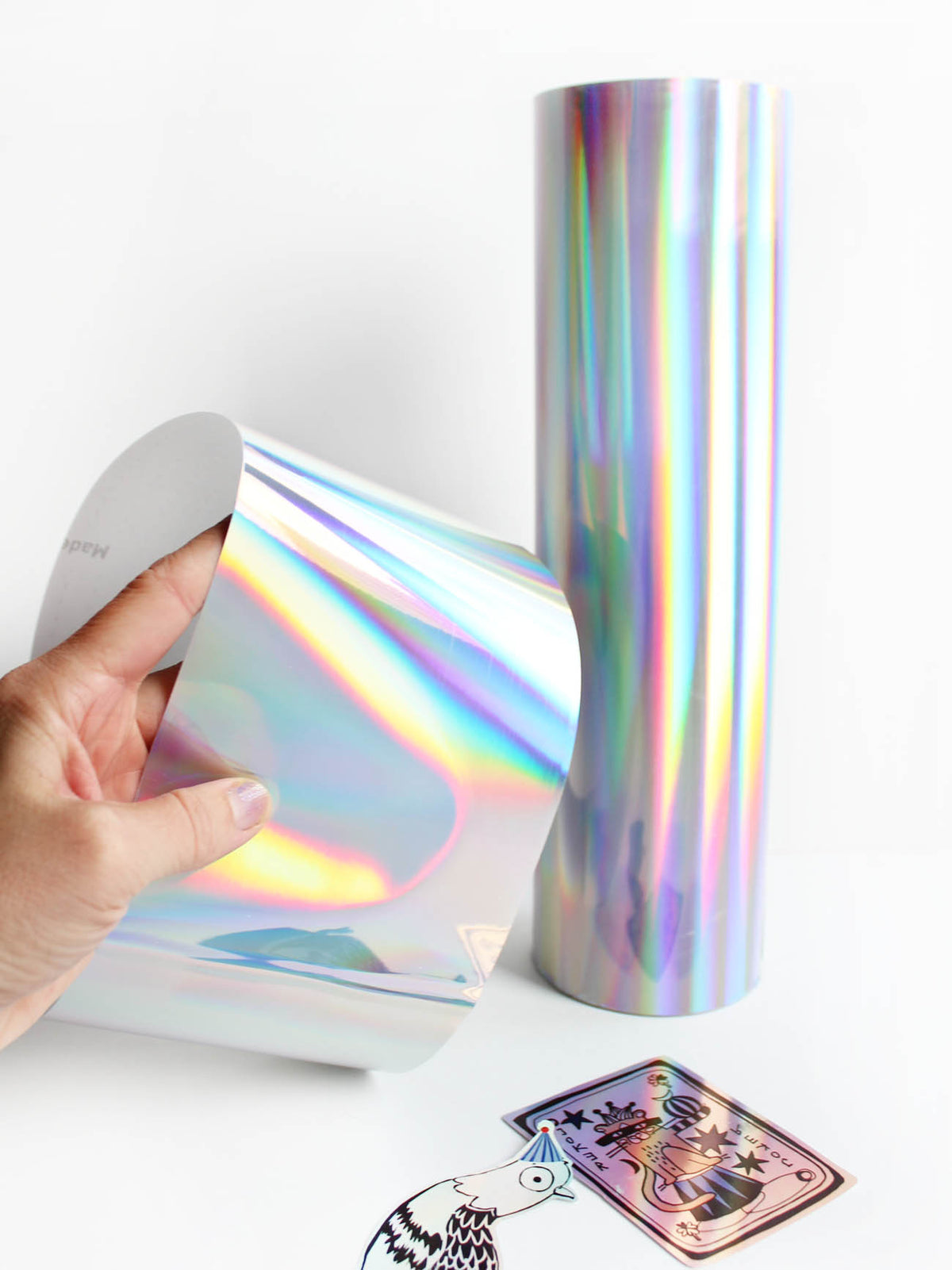 Holografische selbstklebende Polyesterfolie mit silbernem Schimmer und Regenbogenfarben für Plotter und Dekoration