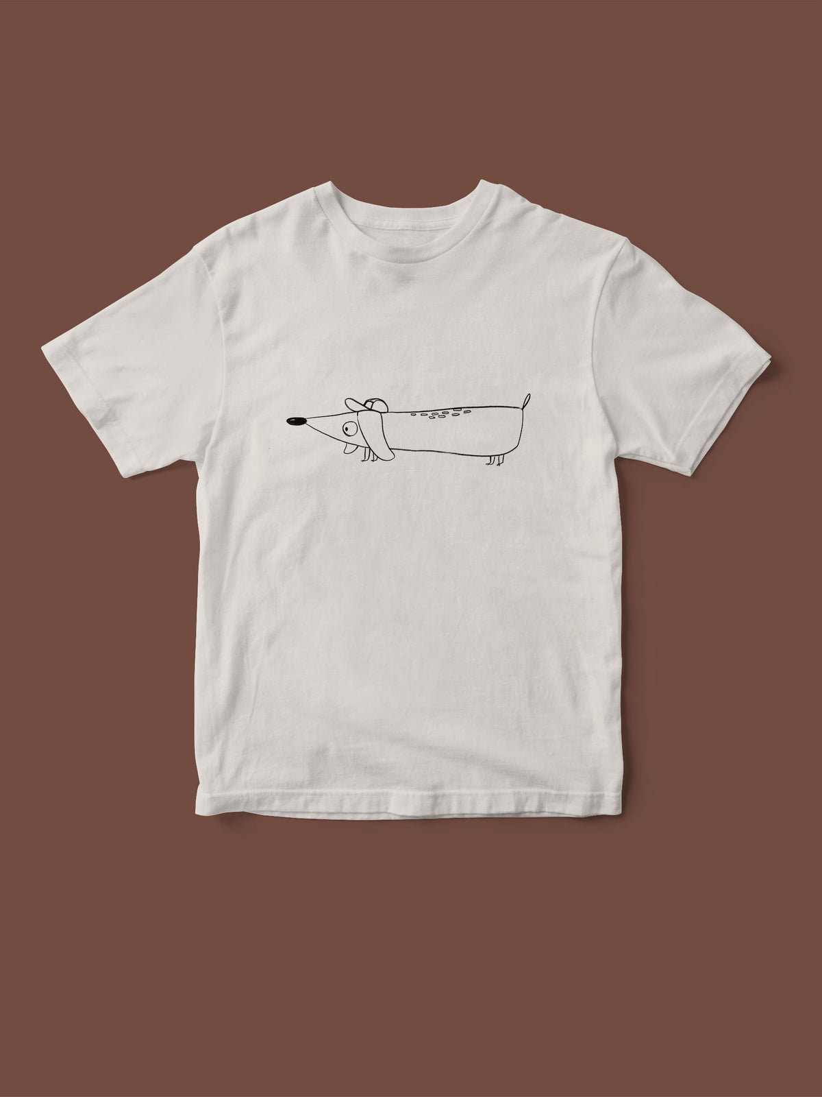 Kinder T-Shirt mit Dackel Detlef Siebdruck Transfer bedruckt von halfbird. Das T-shirt ist weiß, der Druck schwarz