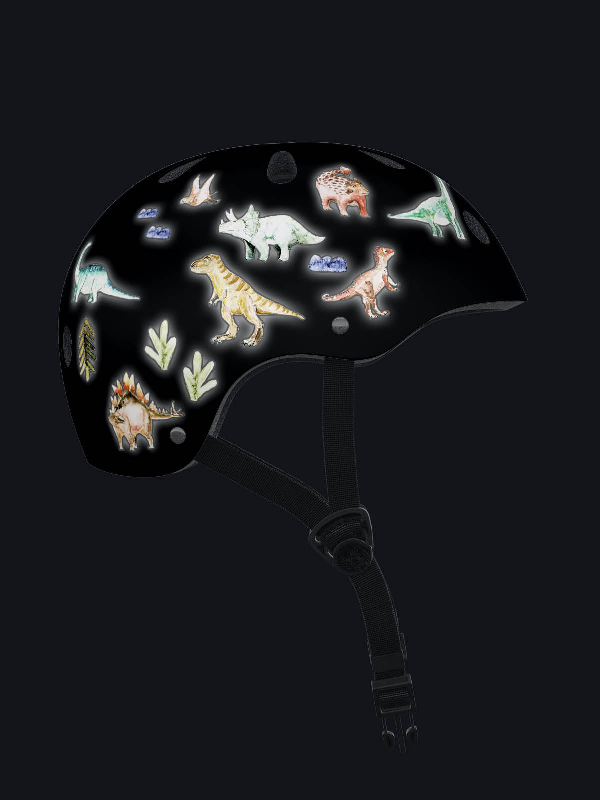 Helm bei Nacht beklebt mit reflektierenden Dino Aufklebern die im Dunkeln leuchten